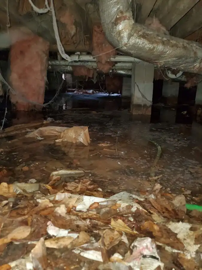 Crawl space flood assessment for Commercial Water Damage Restoration in Demarest
